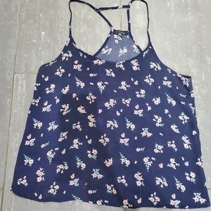 Blue tank top with floral details